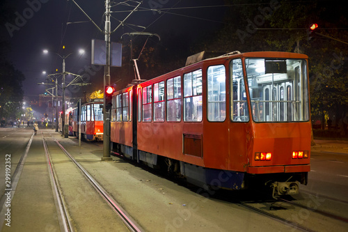 Red trams in the night