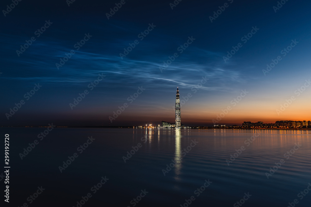 Noctilucent clouds. Shining clouds. Night Silver clouds at summer night in Saint-Petersburg