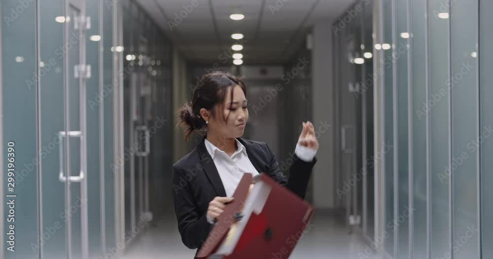 custom made wallpaper toronto digitalClose up shot of successful businesswoman doing victory dance. Young asian manager celebrating her achievement in office hall with dance break - way to success concept 4k