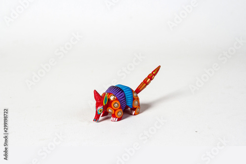 Mexican red armadillo alebrije from oaxaca isolated on white background. Shot from above