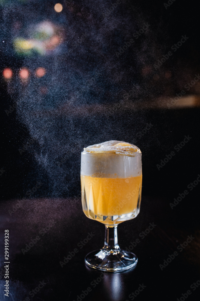 yellow coctail with spray