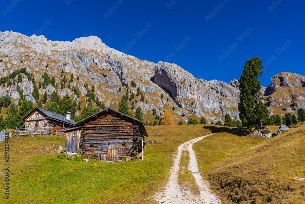 wooden huts in the mountains, dolomite alps, south tyrol