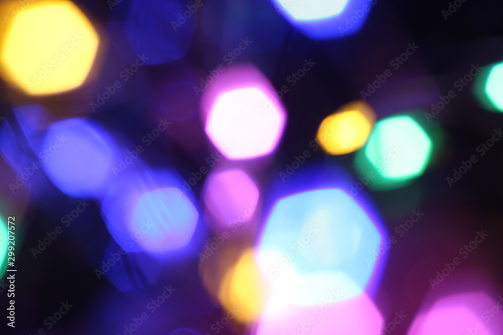 Bright, colorful christmas lights bokeh, blurred focus