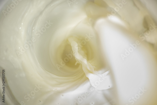 Soft pouring stream of real milk is close