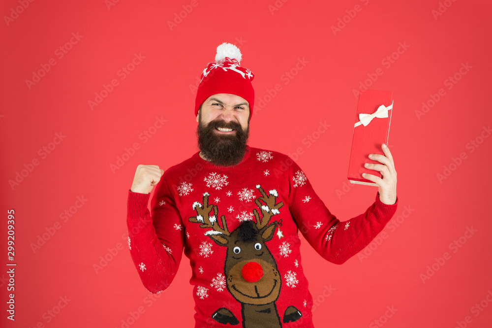 Respect traditions. Merry christmas. Seasonal discount. Gift from santa. Happy new year. Dreams come true. Christmas gift concept. Man celebrate holiday with gift box. Hipster in winter sweater