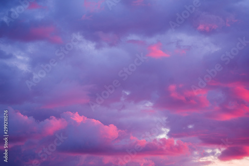 Dramatic pink red sunset, cloudwabe formed by high pression, with beautiful tone color red,pink violet, over the sea, magnificent, nature, sunset concept, add your text © jon11