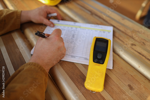 Obraz na plátně Construction miner writing zero alcohol in the blood system on the daily sheet p