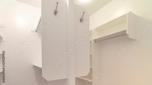 Panorama frame Interior of a dual walk in wardrobe