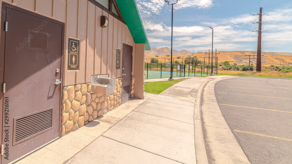 Panorama frame Toilets at recreational fun park on sunny day