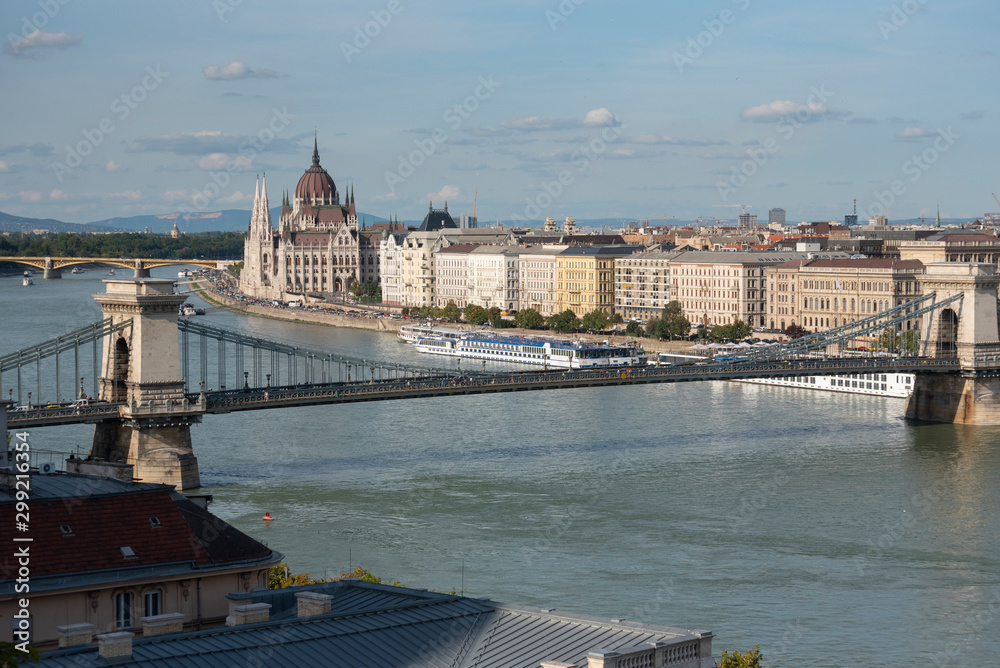 Hungarian Parliament Building with Széchenyi Chain Bridge along the Danube River in Budapest