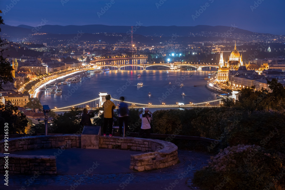 A breathtaking night time view looking down on Budapest along the Danube River A breathtaking night time view looking down on Budapest along the Danube River