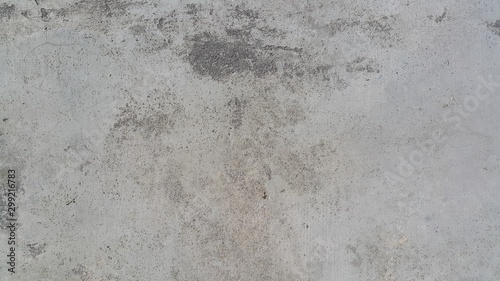 фотографія cement concrete wall floor with rough porous pore texture unpolished weathered g