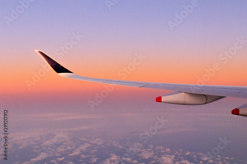 Sky - OCTOBER 16, 2019:  Landscape sunrise view with clouds from Singapore Airlines window seat