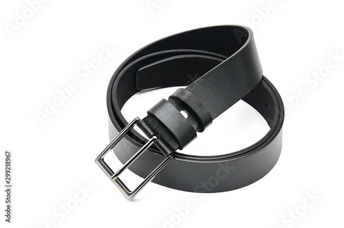 Black belt with a metal fastener on a white background photo