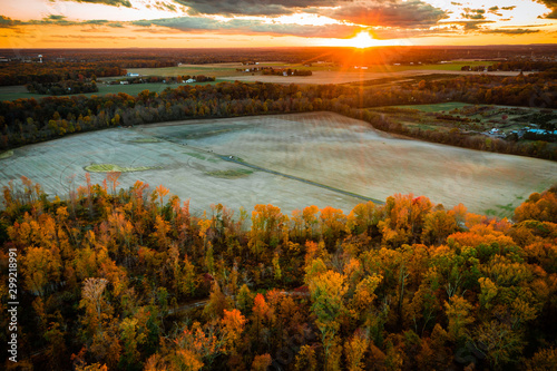 Aerial of Sunset with Fall Foliage