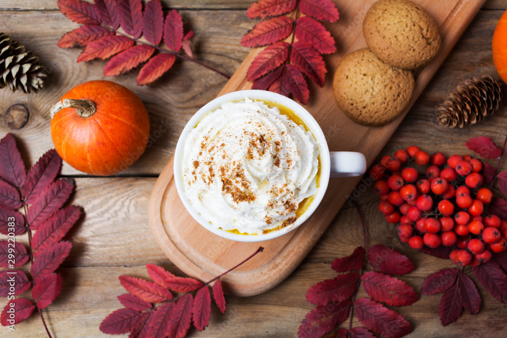 Pumpkin spice latte mug with whipped cream, top view