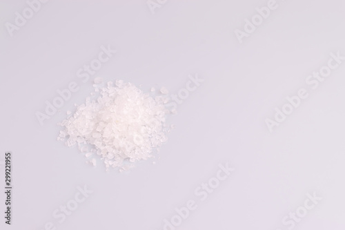 Coarse sea salt isolated on white background; top view