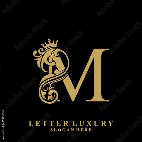 Initial letter M luxury beauty flourishes ornament with crown logo template. photo