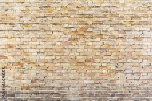 Abstract weathered stained background of brick wall texture, grungy rusty architecture wallpaper