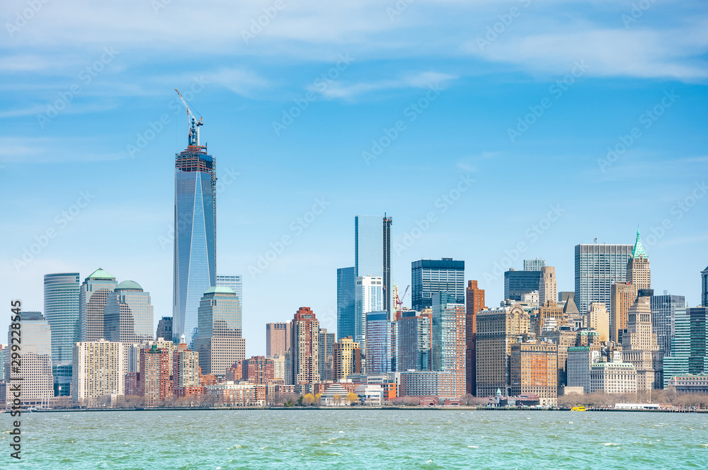 Obraz premium New York City with Manhattan Skyline over Hudson River..