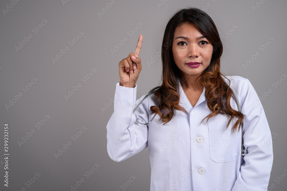 Portrait of Asian woman doctor with wavy hair Portrait of Asian woman doctor with wavy hair