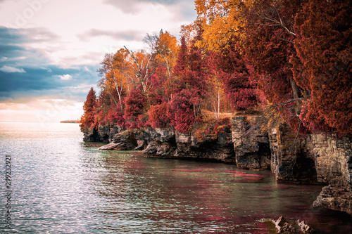 Red and orange trees on the coastal cliffs of Door County, Wisconsin USA. photo