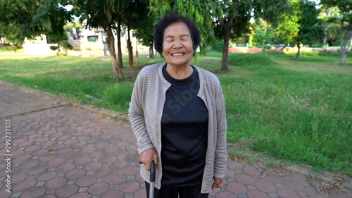 slow-motion of senior woman laughing photo