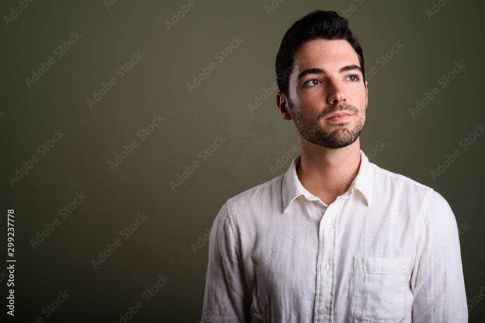 Portrait of young handsome businessman with stubble beard Portrait of young handsome businessman with stubble beard