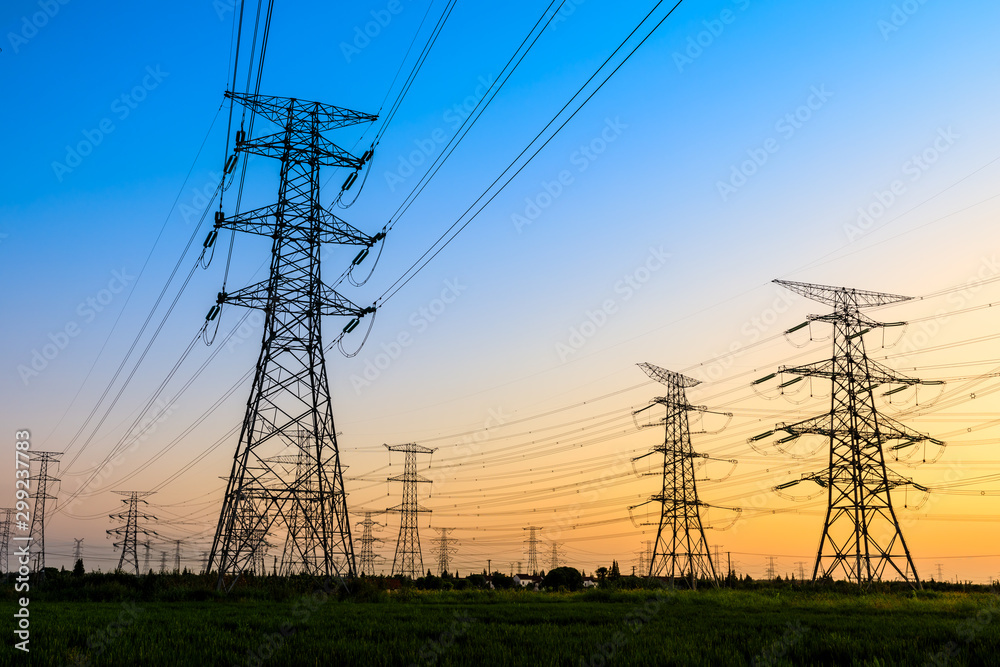 High voltage electricity tower sky sunset landscape,industrial background.