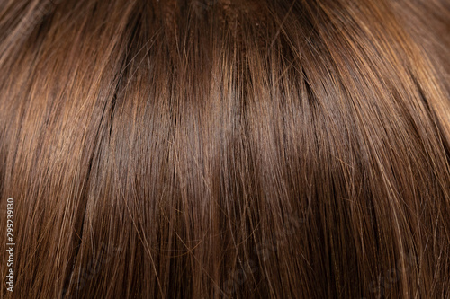 Brown female hair strands, hairstyle close up