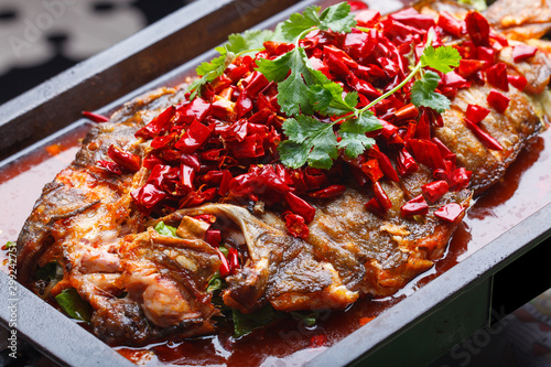A plate of grilled fish, sichuan cuisine