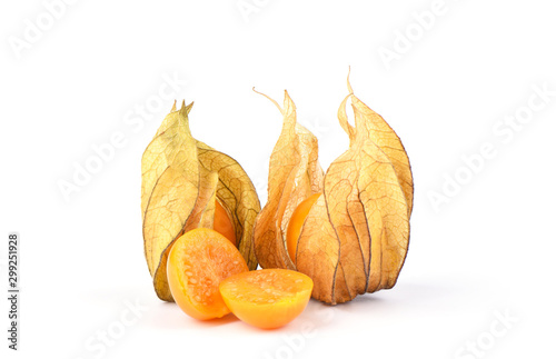 Whole and halves of fresh physalis berries isolated on a white background.