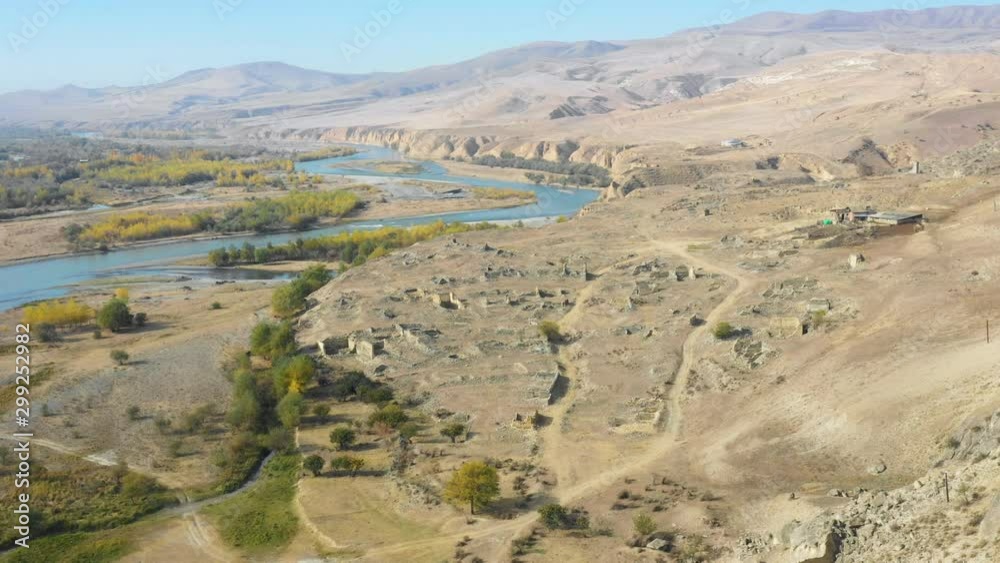 A unique natural landscape located around the ancient cave city Uplistsikhe in Georgia. Ancient stones acquire a bizarre form under the influence of wind, sun and time