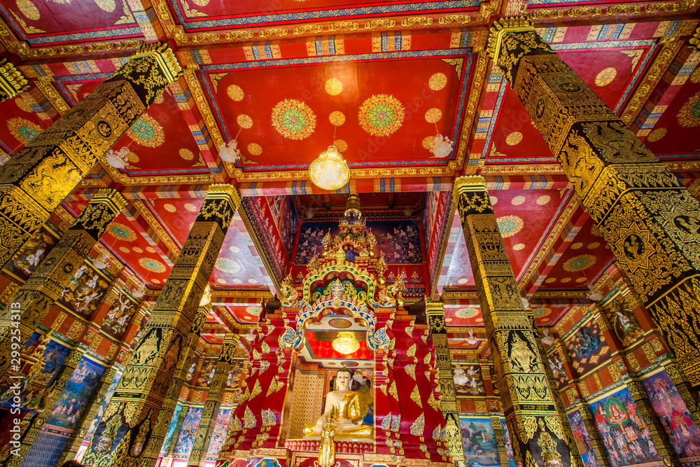 Obraz premium The beautiful sculpture background of, Wat Bang Thong, surrounded by trees, has a large area, is a religious tourist attraction in Krabi, with tourists always visiting, Thailand
