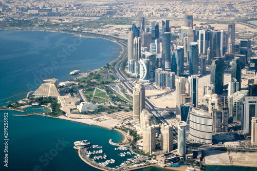 Aerial Shot of Modern Skyscrapers and Corniche Waterfront (Park) in Downtown Doha (West Bay) on a Sunny Clear Day - Doha, Qatar photo
