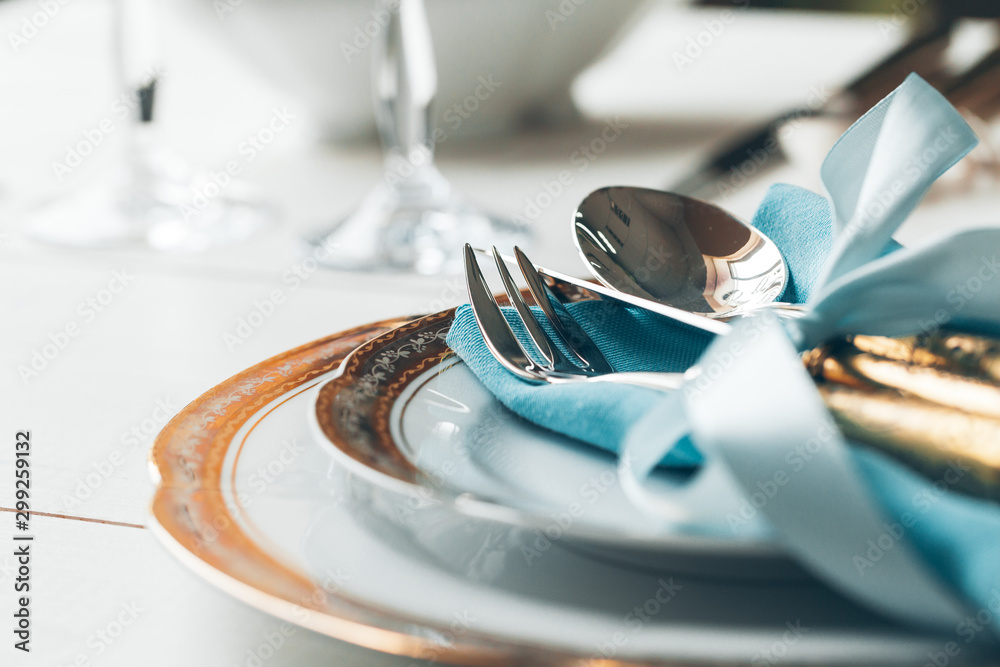 Close up shot of table setting for fine dining with cutlery and glassware - obrazy, fototapety, plakaty 