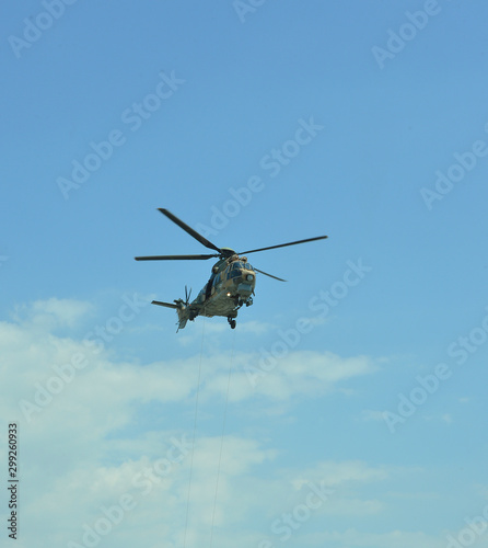 Fototapeta Naklejka Na Ścianę i Meble -  helicopters flying in the sky