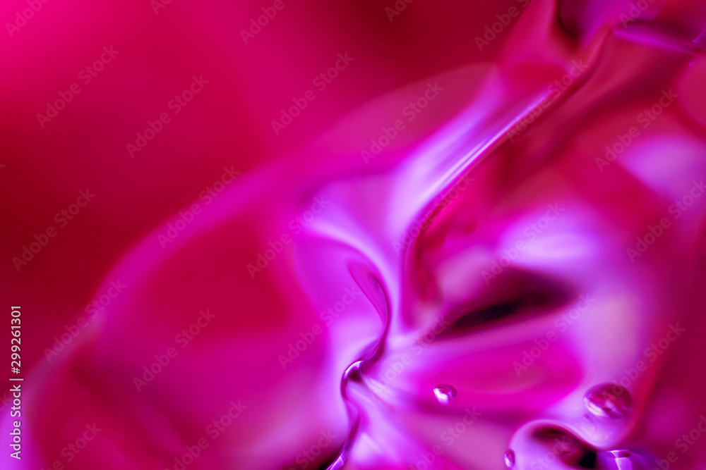 Abstract multi-colored image. Red and pink shades. Gel in macro. Copy space. Abstract multi-colored image. Red and pink shades. Gel in macro. Copy space.