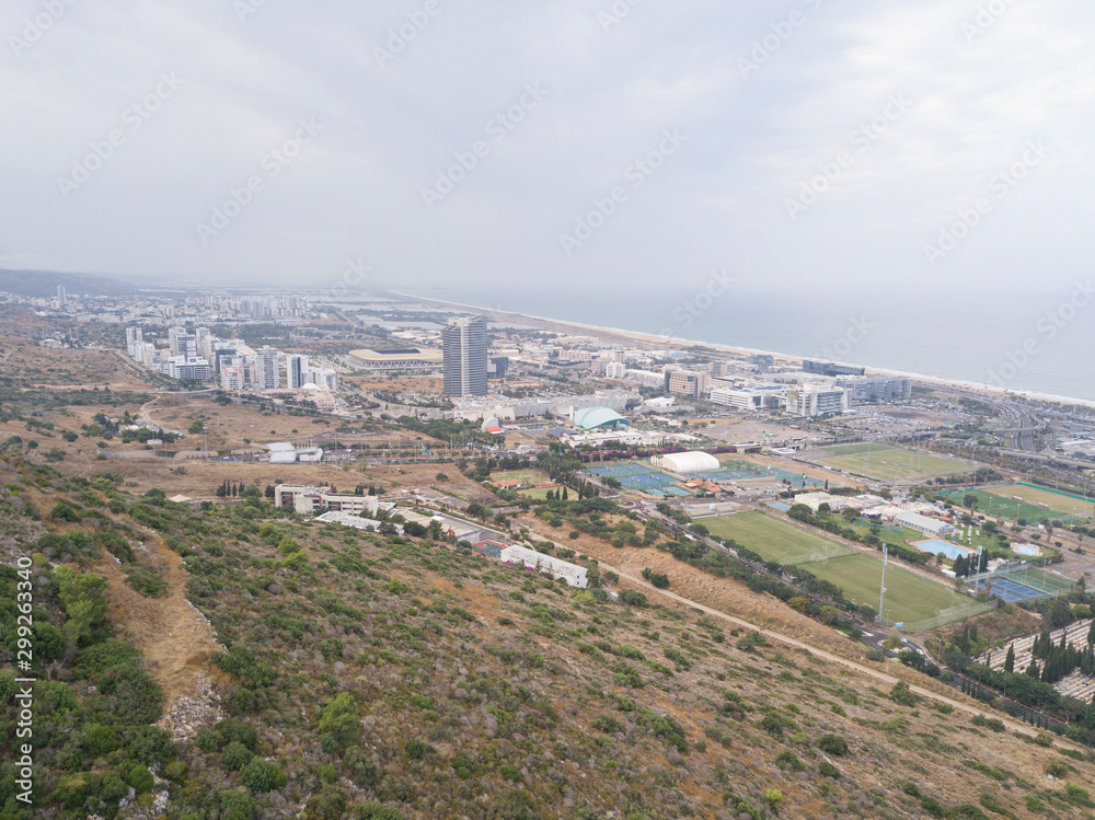 Fototapeta premium Israel, Haifa Southern District. Aerial panoramic view on a cloudy day.
