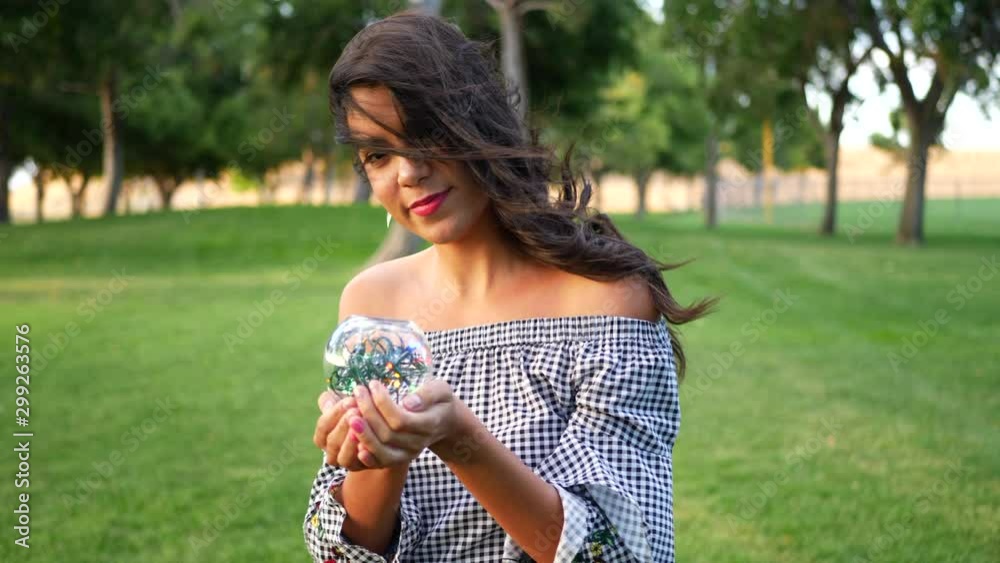 A beautiful and magical gypsy in a forest with an enchanted crystal ball SLOW MOTION. A beautiful and magical gypsy in a forest with an enchanted crystal ball SLOW MOTION.