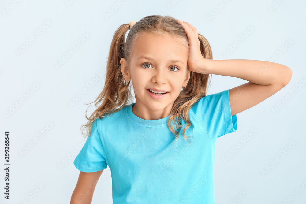 Cute little girl on light background Cute little girl on light background