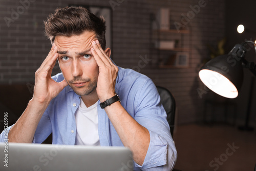Tired man trying to meet de...