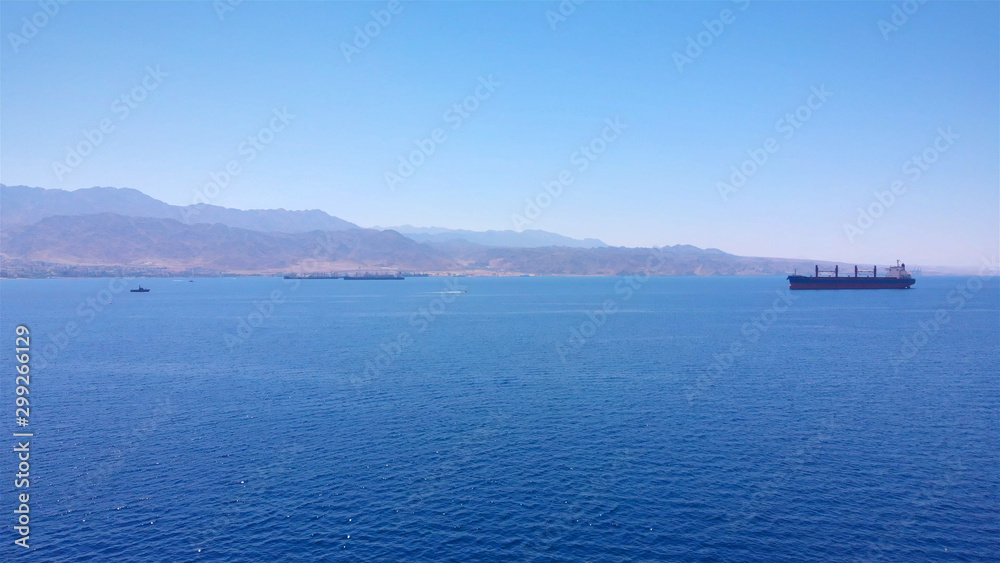 Jordan Mountains and red sea, with large tanker ship
