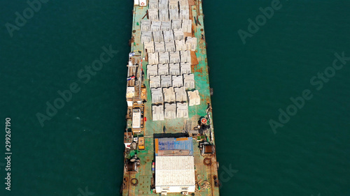 Drone view over Large barge with construction materials in Mediterranean sea new Harbor © ImageBank4U