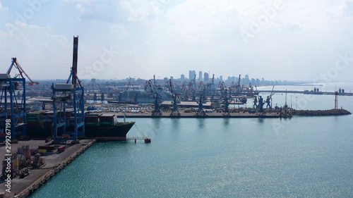 Drone view over Ashdod port with large tanker boat in Mediterranean sea, Israel