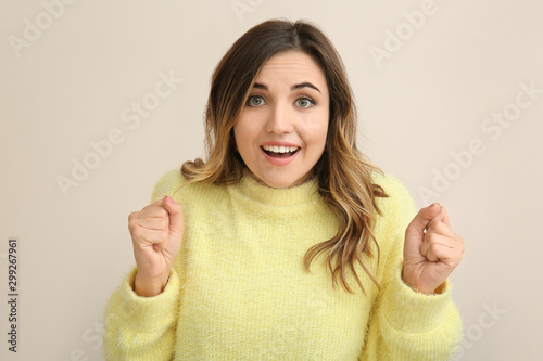 Surprised young woman on li...