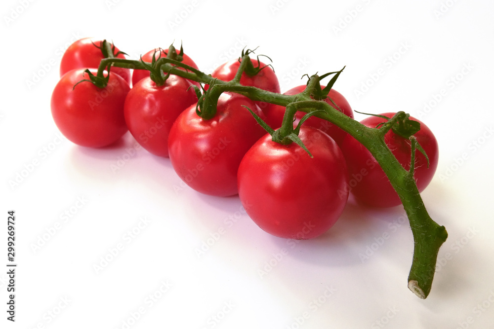 Red cherry tomatoes isolated on white background Red cherry tomatoes isolated on white background