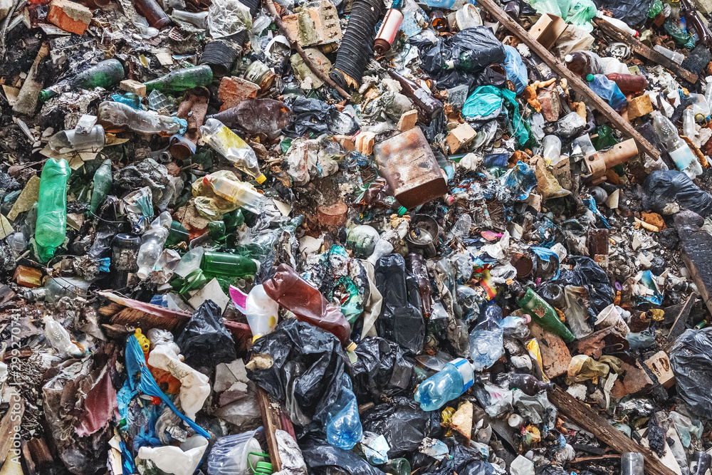 Background of garbage waste with a huge amount of used packaging from household products and food Background of garbage waste with a huge amount of used packaging from household products and food