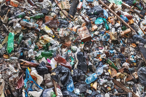 Background of garbage waste with a huge amount of used packaging from household products and food