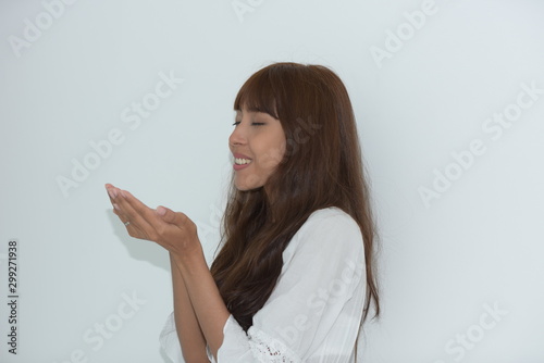 Young beautiful asian couple posing at outdoor photosession photo